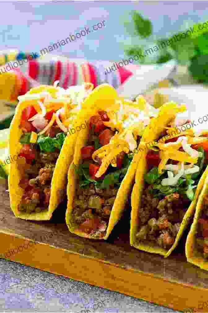 A Plate Of Tacos With Beef, Cheese, And Lettuce Twelve Recipes Cal Peternell